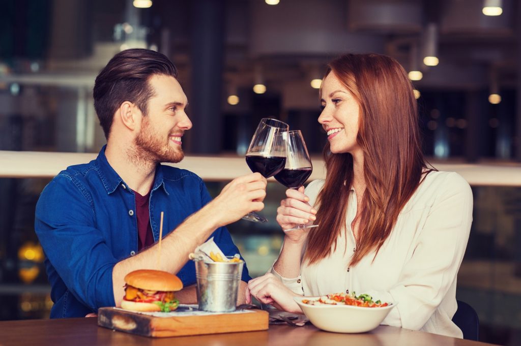 young couple drinking wine