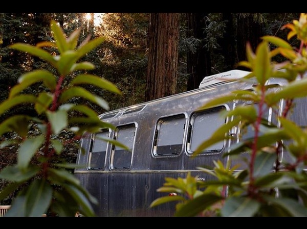 old camper in wilderness