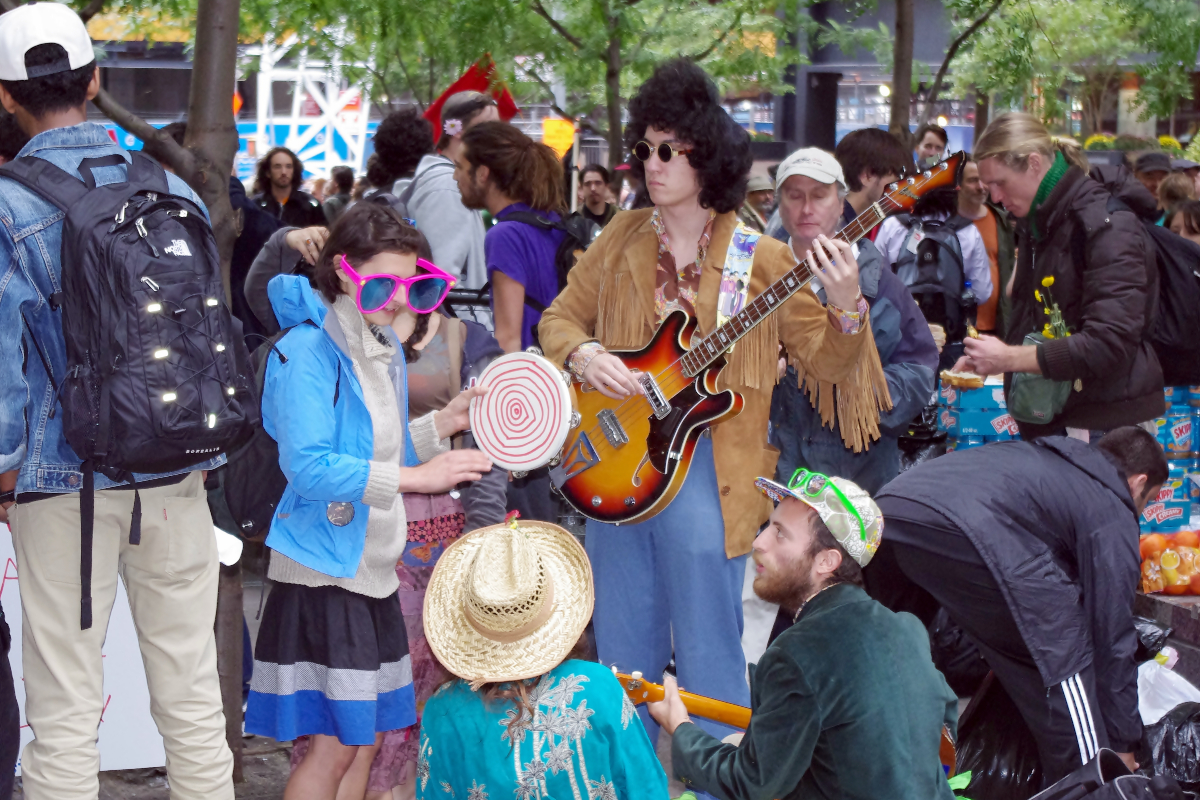 People Dressed Like Hippies In Crowd