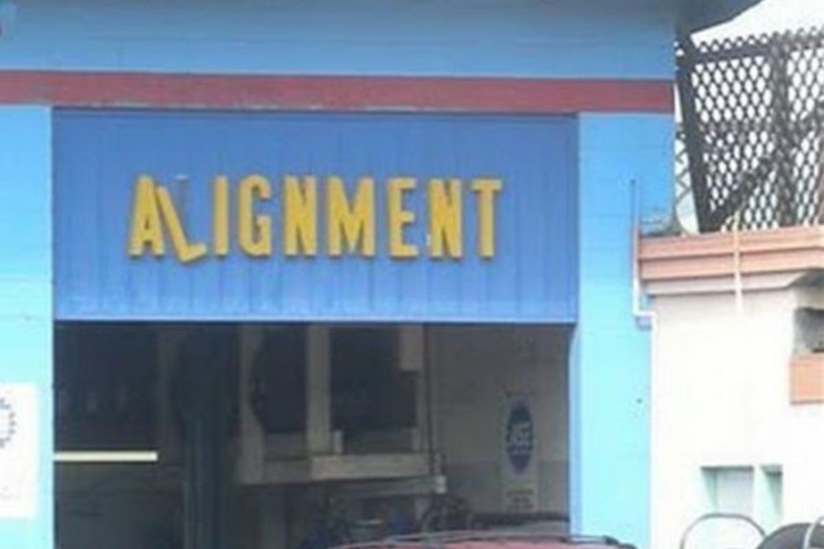 Crooked Alignment Business Sign