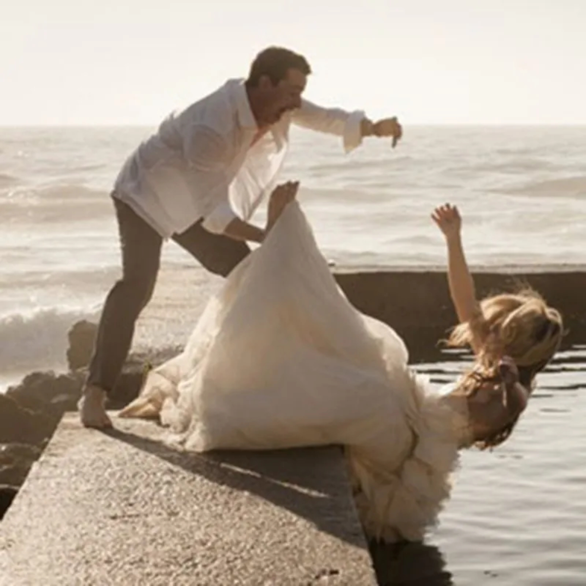 Bride Falling Wedding Photo