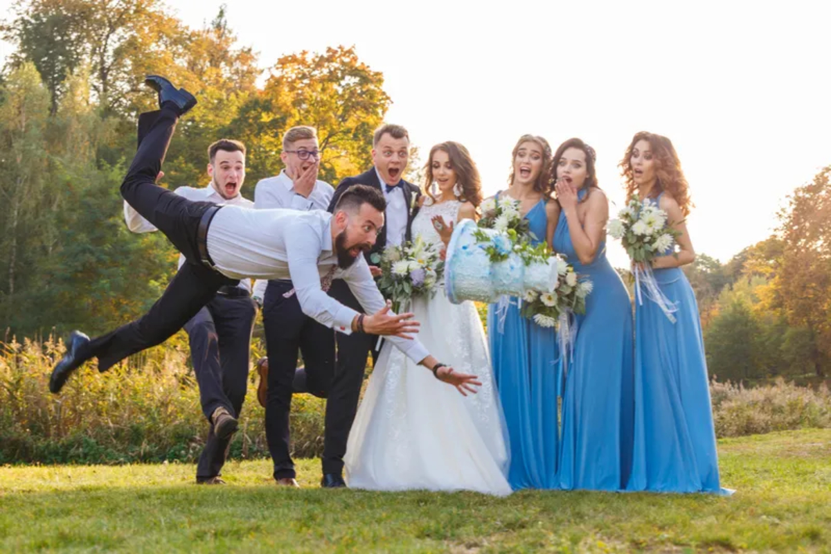 Groomsmen Dropping Wedding Cake