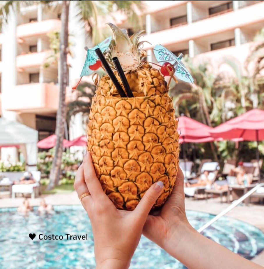 Pinapple with a drink inside, Costco travel to Hawaii